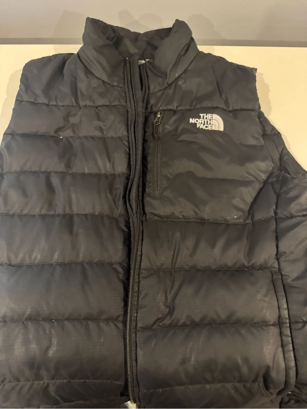 The North Face Black Puffer Vest with Chest Zip